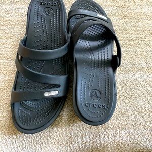 Crocs Sandles size 7 made of rubber. Never worn.